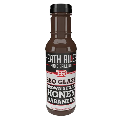 A bottle of Heath Riles BBQ Glaze Brown Sugar Honey Habanero.