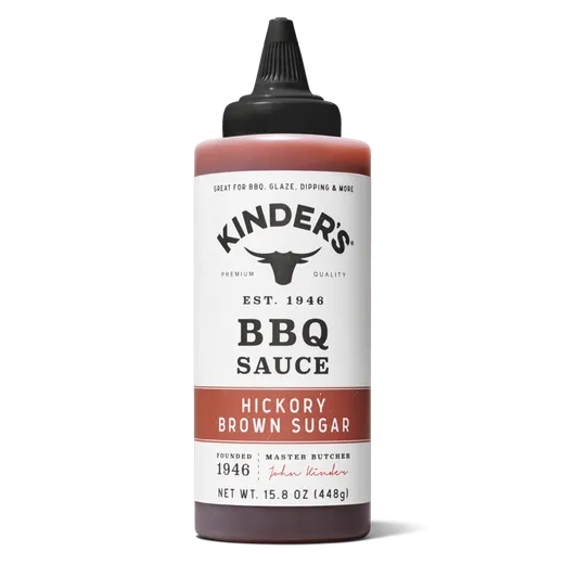 Kinder's Hickory Brown Sugar BBQ sauce bottle against a black background.
