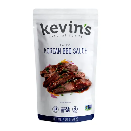 A pouch of Kevin's Natural Foods Korean BBQ Sauce on a white background.