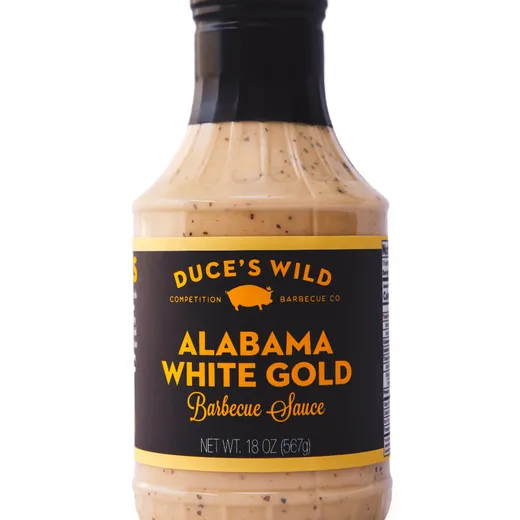 A front view of a bottle of Duce's Wild Alabama White Gold barbecue sauce.