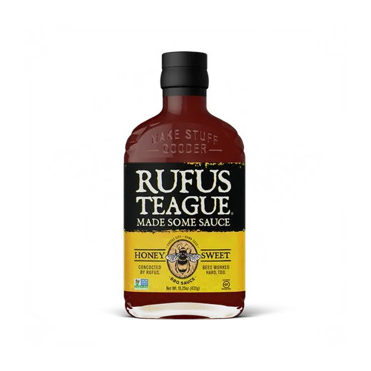 A front view of a Rufus Teague honey sweet BBQ sauce bottle.