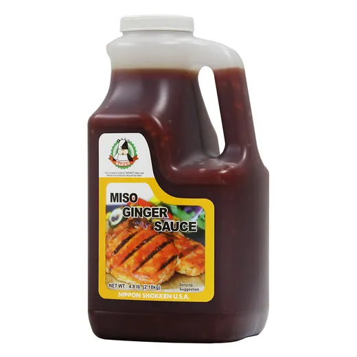 A single large gallon jug of Miso Ginger Sauce.
