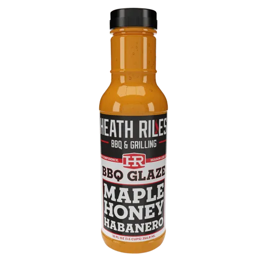 A clear front-facing product shot of the Heath Riles Maple Honey Habanero BBQ Glaze bottle.