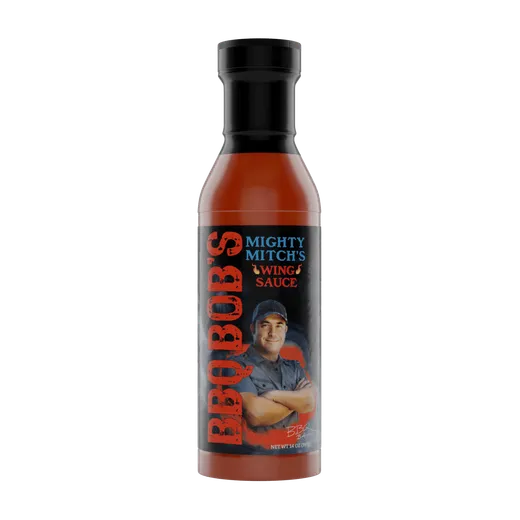 A front view of a bottle of Mighty Mitch's Wing Sauce against a plain black background.