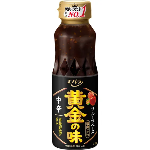 A bottle of Ohgon No Aji medium-hot Japanese BBQ sauce stands in front of a white background.