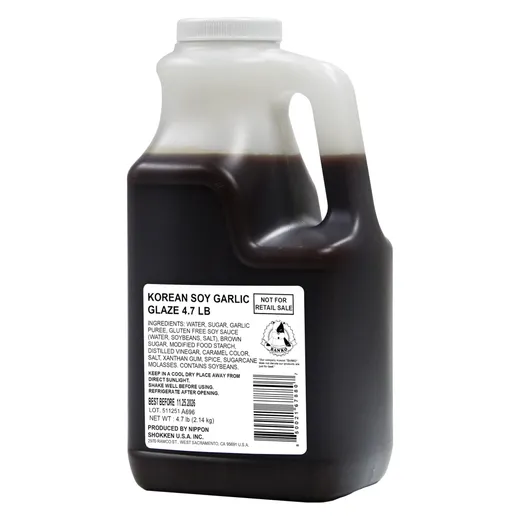 A large gallon jug of Korean Soy Garlic Glaze.