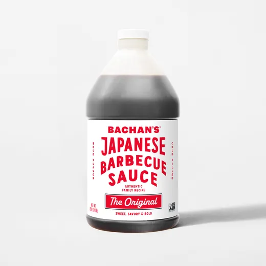 A front view of a bottle of Bachan's The Original Japanese Barbecue Sauce against a white background.