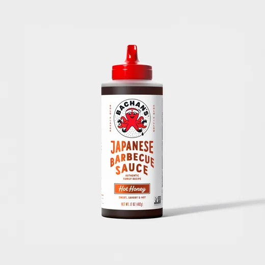 A bottle of Bachan's Japanese Barbecue Sauce Hot Honey against a white background.