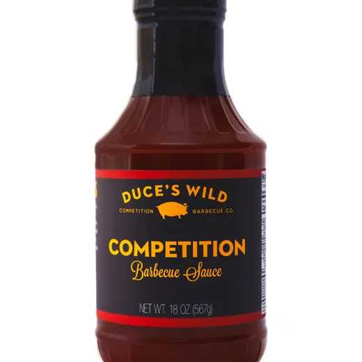A front-facing view of a Duce's Wild Competition Barbecue Sauce bottle.